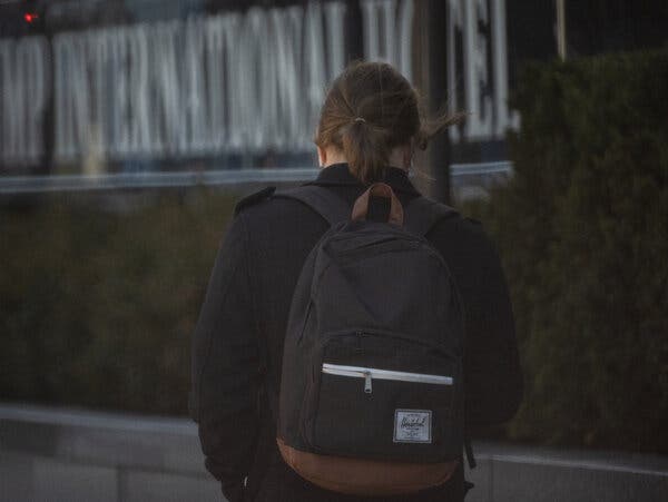 My husband did not realize he had three location trackers in his backpack and a photographer trailing him.